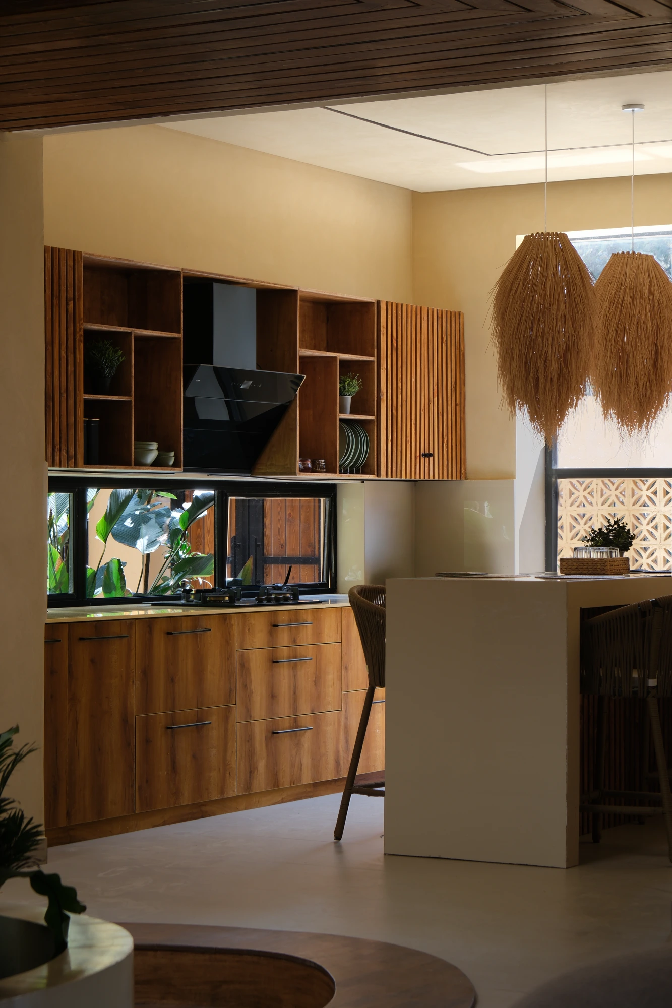 The full kitchen and island inside a Dune Villa